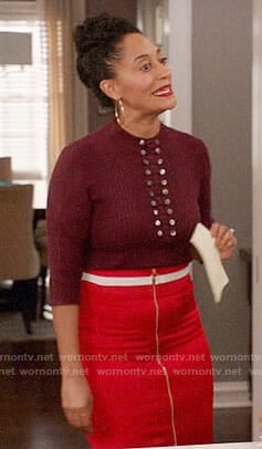 Rainbow's purple buttoned top and red zip-front skirt on Black-ish