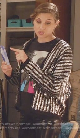 Nomi's metallic striped jacket and beatles t-shirt on Grown-ish