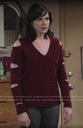 Tessa's red sweater with sleeve cutouts on The Young and the Restless