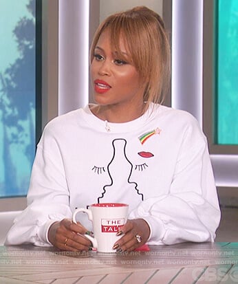 Eve's white embroidered sweatshirt on The Talk