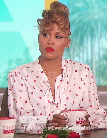 Eve's white heart and shoe print blouse on The Talk