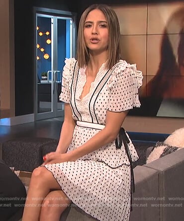 Erin's white polka dot ruffle dress on E! News