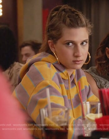Nomi's yellow and purple striped hoodie on Grown-ish
