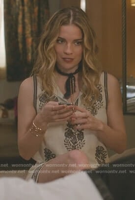 Alexis's white floral embroidered mini dress on Schitt's Creek