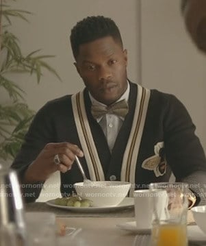 Jeff's black cardigan with bee patch on Dynasty