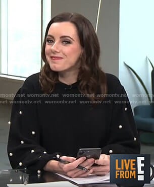 Melanie's black sweater with pearls on Live from E!