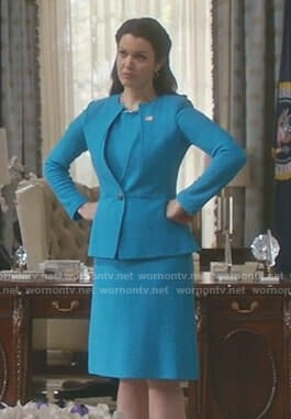 Mellie's turquoise blue dress and split neck jacket on Scandal