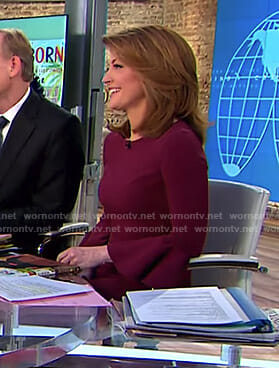 Norah's burgundy bell sleeve dress and fan earrings on CBS This Morning