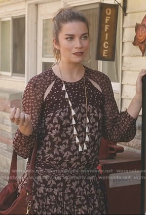 Alexis's brown mixed print dress on Schitt's Creek