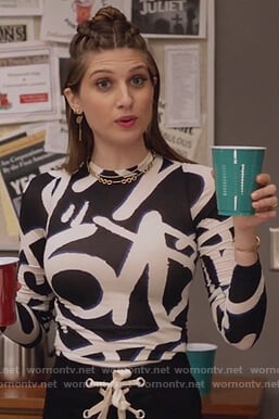Nomi's long sleeve graffiti print top on Grown-ish