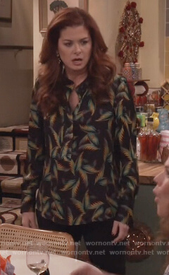 Grace's black palm leaf print blouse and chandelier earrings on Will and Grace