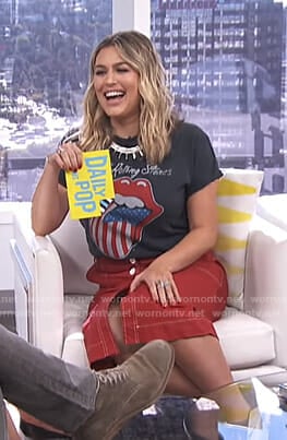 Carissa's black The Rolling Stones t-shirt and red skirt on E! News Daily Pop