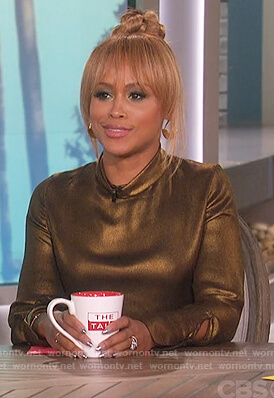 Eve's gold mock neck top on The Talk