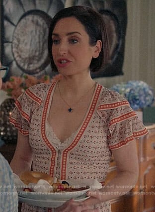 Jen's floral dress with ruffled sleeves on Life in Pieces