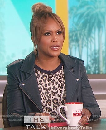 Eve's leopard print t-shirt and leather jacket on The Talk