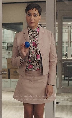 Lucca's pink studded skirt suit and floral blouse on The Good Fight