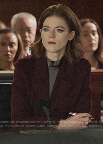 Maia's taupe mock neck blouse and burgundy coat on The Good Fight