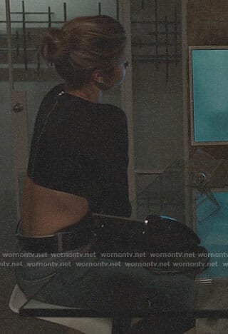 Meghan's black long sleeved top with cutout back on The Arrangement