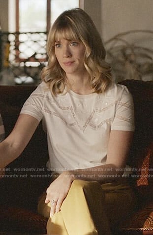 Melissa's white lace-inset top on Last Man on Earth