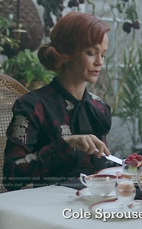 Penelope's black floral tie-neck dress on Riverdale