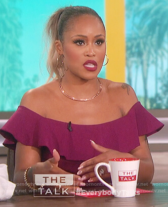 Eve's purple ruffle off shoulder top on The Talk