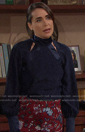 Quinn's navy blouse with cutouts and red floral trousers on The Bold and the Beautiful