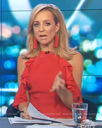 Carrie's red cold shoulder ruffle jumpsuit on The Project