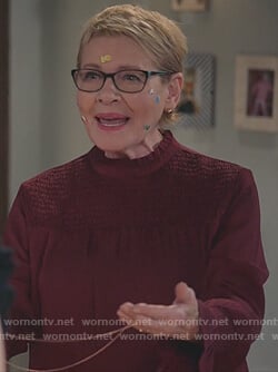 Joan's red smocked front blouse on Life in Pieces