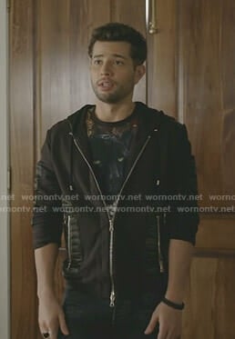 Sam's black panther print t-shirt and zipped jacket on Dynasty