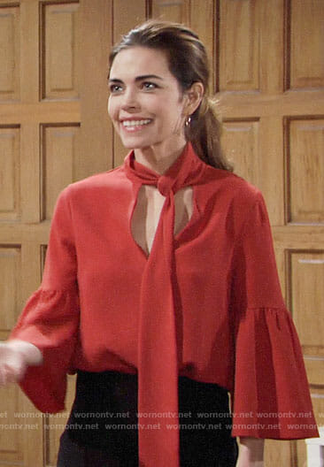 Victoria's orange tie neck blouse on The Young and the Restless