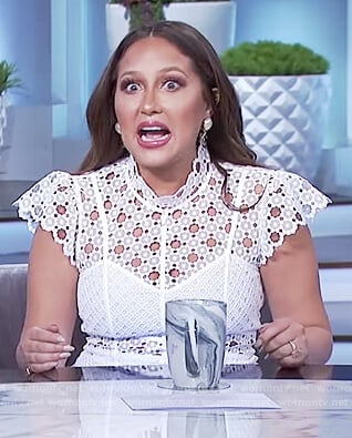 Adrienne's white cutout lace dress on The Real