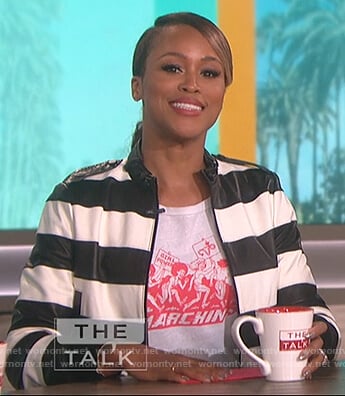 Eve's white marchin t-shirt and striped leather jacket on The Talk