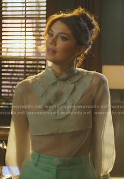Cristal's green ruffled sheer top and satin pants on Dynasty