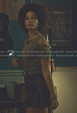 Maia's khaki cold-shoulder tee and studded mini skirt on Shadowhunters