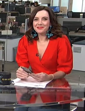 Melanie's red wrap blouse and turquoise beaded earrings on Live from E!