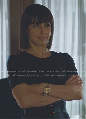 Quinn's belted sheath dress on UnReal