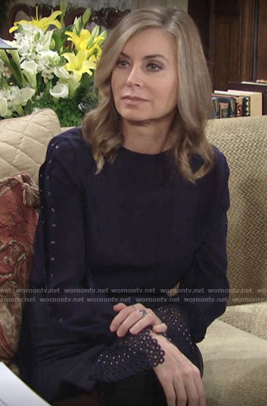 Ashley's navy blouse with eyelet cuffs on The Young and the Restless