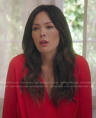 Camille's red wrap blouse on Splitting Up Together