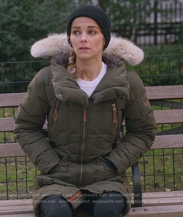 Lizzie's green parka with fur trim hood on Instinct