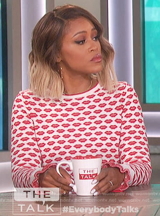Eve's white and red lip print sweater on The Talk