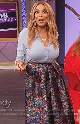 Wendy's blue cardigan and floral print skirt on The Wendy Williams Show