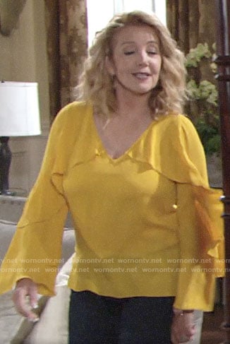 Nikki's yellow ruffled blouse on The Young and the Restless