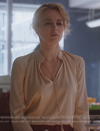 Lizzie's pink tassel tie satin blouse on Instinct
