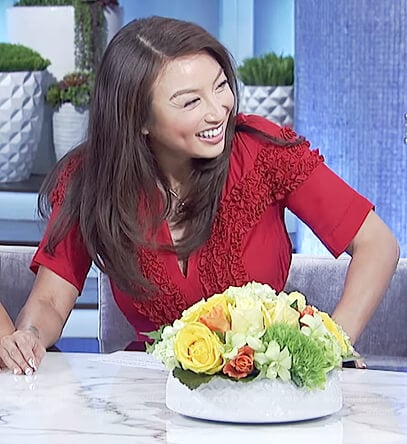 Jeannie's red v-neck ruffle dress on The Real