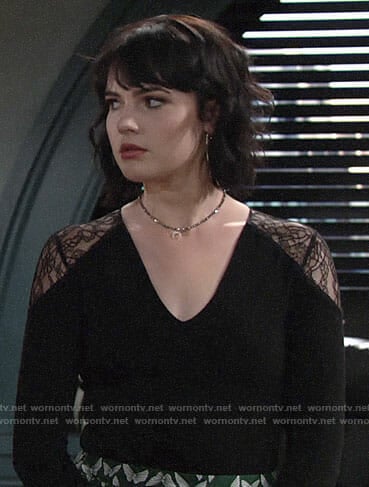 Tessa's lace shoulder top and green butterfly print pants on The Young and the Restless