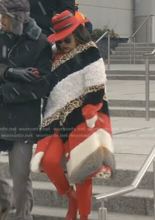 Cookie's striped fur coat and red snake hat on Empire