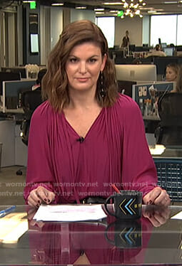 Kristin dos Santos's pink ruffle sleeve blouse on Live from E!