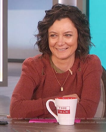 Sara's brown shoulder cutouts sweater on The Talk