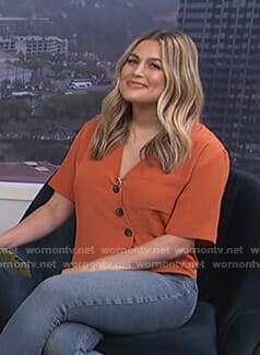 Carissa's orange asymmetric shirt on E! News Daily Pop