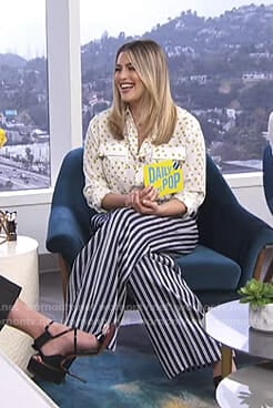 Carissa's white printed blouse and striped pants on E! News Daily Pop